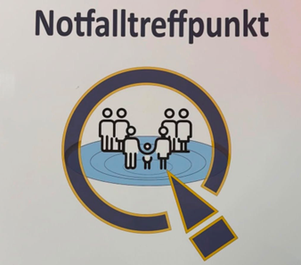 Bild eines Schildes "Notfalltreffpunkt"